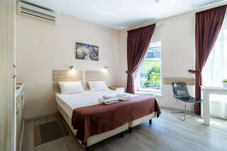 Гостиница Багет Нижний Новгород Эконом с двуспальной кроватью с ванной комнатой на этаже-13